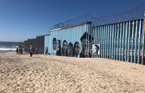 Playas de Tijuana mural by Lizbeth de la Cruz, including portraits of community storytellers.
